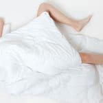 Woman-sleeping-naked-laying-on-her-back